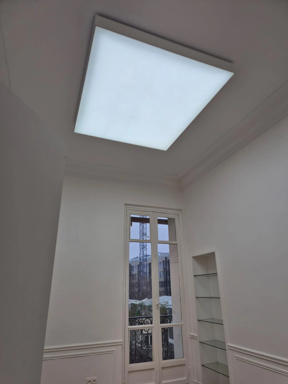Evenly diffused light from a white translucent stretch fabric panel