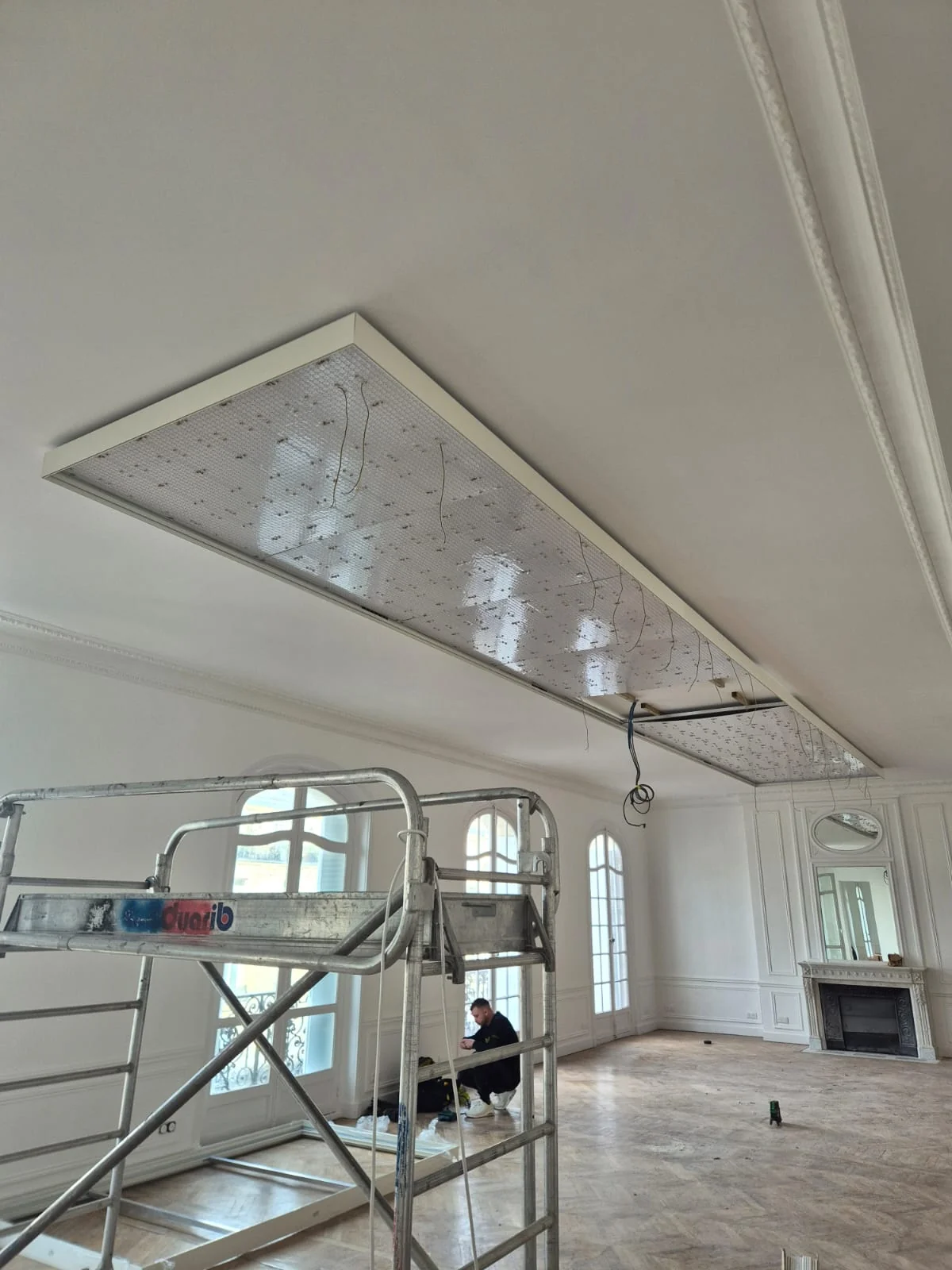Installation stage showing the LED lighting within the lightbox frame
